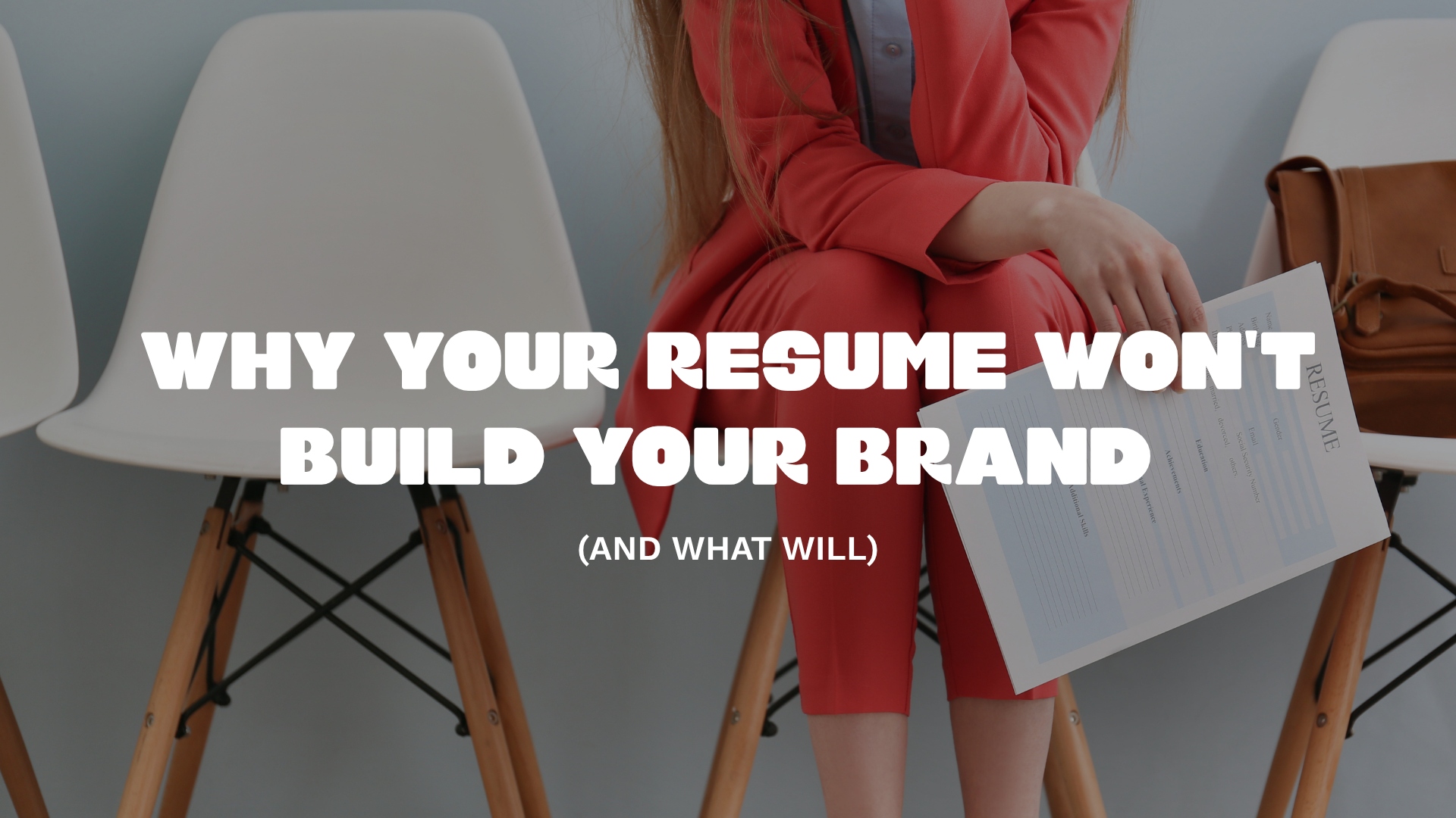Woman in a red blazer holding a resume — why your corporate resume won't build your brand as an executive turned entrepreneur